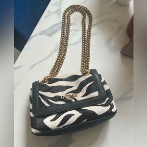 Guess Animal print bag.